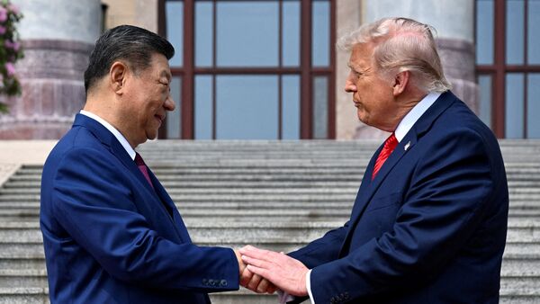 US President Donald Trump participates in events at the Great Hall of the People and does a greeting with the President of the People’s Republic of China Xi Jinping 14 May.