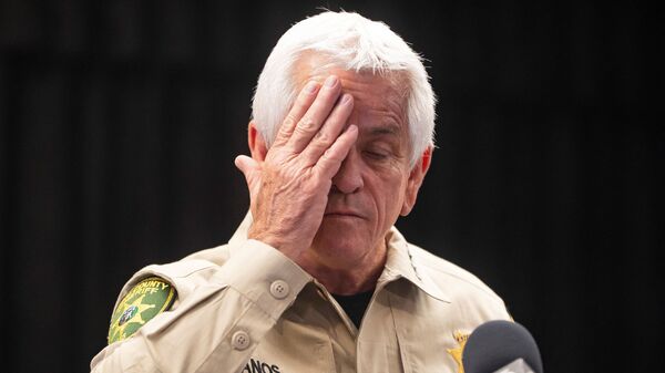 Pima County Sheriff Chris Nanos reacts during a press conference after the disappearance of Nancy Guthrie, the 84-year-old mother of U.S. journalist and television host Savannah Guthrie, who went missing from her home, in Tucson, Arizona, U.S. February 5, 2026.  REUTERS/Rebecca Noble