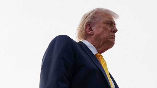 US President Donald Trump speaks to the media before boarding Air Force One for departure to Miami, Florida, at Palm Beach International Airport in West Palm Beach, Florida, U.S., May 2, 2026.