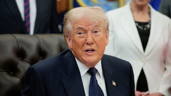 U.S. President Donald Trump speaks during an event to sign a memorandum in the Oval Office at the White House in Washington, D.C., U.S., May 5, 2026. REUTERS/Evan Vucci