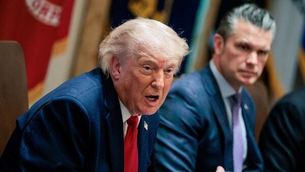 US President Donald Trump speaks next to Defense Secretary Pete Hegseth during a cabinet meeting in the Cabinet Room at the White House, in Washington, D.C., US, on 27 May 2026