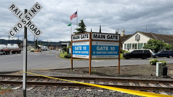 The exterior of the Nippon Dynawave Packaging Co. is shown, after a tank containing hazardous liquid imploded, on Tuesday, May 26, 2026 in Longview, Wash. (AP Photo/Claire Rush)
