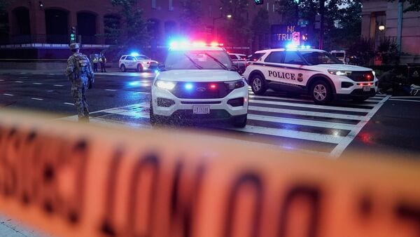 US Secret Service Police are seen on a crime scene after responding to reports of shots fired near the White House, Saturday, May 23, 2026, in Washington.