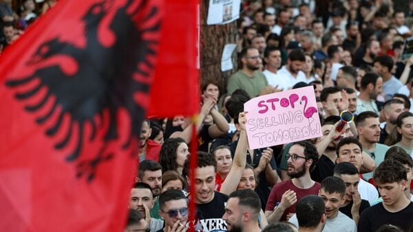 Demonstrators take part in a protest against a luxury resort plan by a company linked to Donald Trump's son-in-law, Jared Kushner, on an environmentally sensitive part of the Adriatic coast, in Tirana, Albania, June 5, 2026. REUTERS/Florion Goga