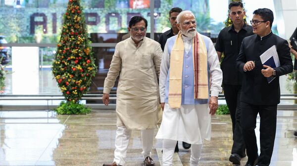 Daman, Jun 05 (ANI): Prime Minister Narendra Modi during the inauguration of the New Terminal Building of NAMO Airport, in Daman on Friday. Administrator of Dadra and Nagar Haveli and Daman and Diu, Praful Khoda Patel also present. (DPR PMO/ANI Photo)