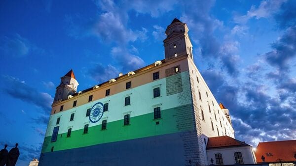 A view of Bratislava Castle as it illuminates in the colours of the Indian flag following the visit of Prime Minister Narendra Modi, in Bratislava on Monday. (@MEAIndia X/ANI Photo)