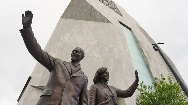 A statue of former President Barack Obama and former first lady Michelle Obama is seen at the Obama Presidential Center ahead of the dedicated ceremony Thursday, June 18, 2026, in Chicago. (AP Photo/Jeff Roberson)