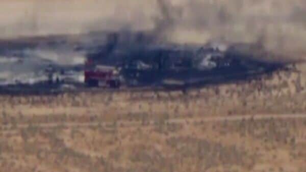 Video from the area showed a large plume of thick black smoke rising from the desert near the base. (Image: X)