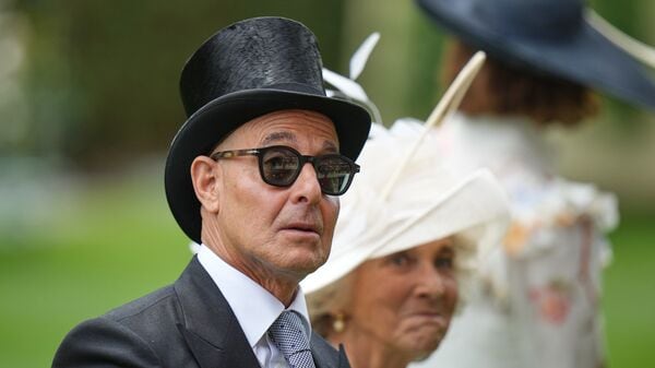 American actor Stanley Tucci attends the third day of the Royal Ascot horse race meeting, traditionally called Ladies Day in Ascot, England, Thursday, June 18, 2026. (AP Photo/Alastair Grant)