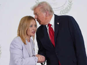 Donald Trump greets Italy's PM Giorgia Meloni