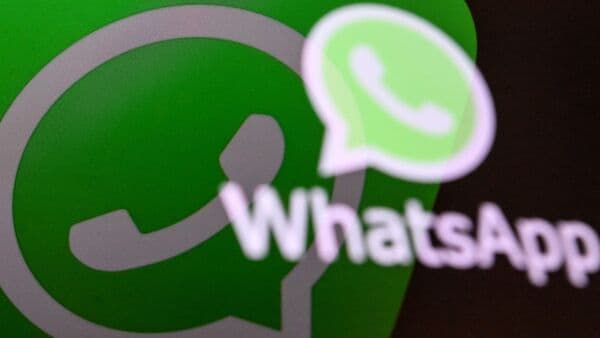 (FILES) This illustration photograph taken on April 11, 2023, shows the US instant messaging software Whatsapp's logo on a smartphone screen in Moscow. Russia said on November 28, 2025 it was considering banning popular messaging service WhatsApp unless it complied with Russian law, accusing it of failing to prevent and suppress crime. (Photo by Kirill KUDRYAVTSEV / AFP)
