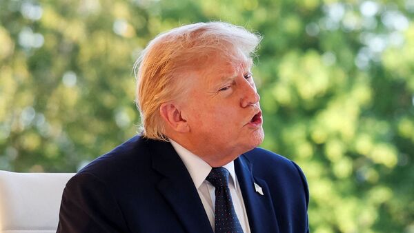 US President Donald Trump attends a working leader’s dinner during the G7 summit in Evian-les-Bains, France, June 15, 2026.