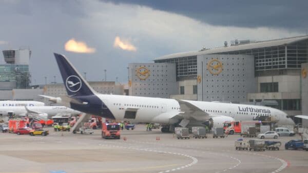 A Boeing Co. 787-9 aircraft, operated by Deutsche Lufthansa AG,with a collapsed nose landing gear, parked at a gate at Frankfurt Airport in Frankfurt, Germany, on Thursday, June 4, 2026. The airliner suffered a collapsed nose landing gear while parked, likely causing damage to the almost factory-fresh airliner. Photographer: Alex Kraus/Bloomberg