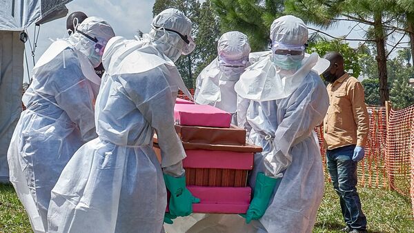 Latest news on June 11, 2026: Ebola outbreak: Red Cross workers wear protective gear to carry the coffin of man who died due to Ebola virus infection at the Centre Medical Evangelique (CME), in Democratic Republic of Congo, on June 10, 2026.