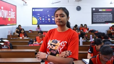 Shrishti,19, who will sit the upcoming NEET (National Eligibility cum Entrance Test) retest, poses for a photo in a coaching institute classroom in New Delhi, India June 18, 2026. (REUTERS)