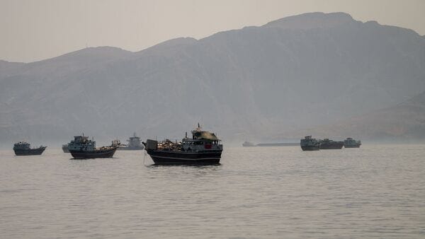Vessels are anchored in the Strait of Hormuz, as seen from Musandam, Oman, June 19, 2026. REUTERS/Stringer