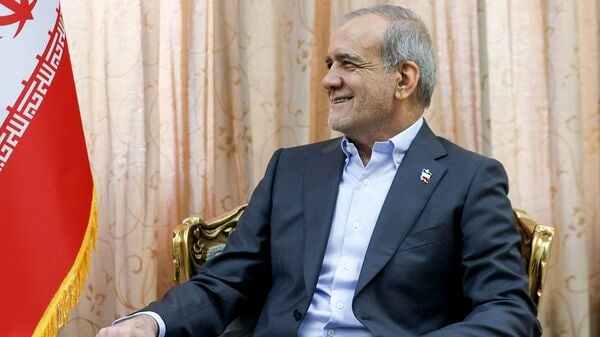 In this handout picture provided by the Iranian presidency, Iran's President Masoud Pezeshkian looks on during a meeting with Pakistan's army chief in Tehran on May 23, 2026. (Photo by Iranian Presidency / AFP)