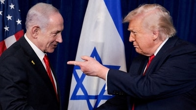 US President Donald Trump points his finger towards Israeli Prime Minister Benjamin Netanyahu as they shake hands during a press conference after meeting in 2025. (REUTERS)
