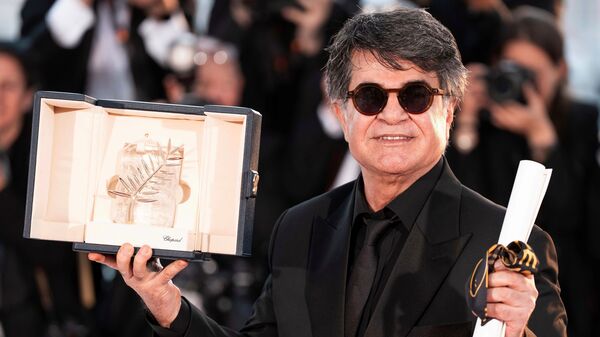 FILE - Director Jafar Panahi, winner of the Palme d'Or for the film 'It Was Just an Accident,' appears at the awards ceremony photo call at the 78th international film festival, Cannes, southern France, on May 24, 2025. (Photo by Scott A Garfitt/Invision/AP, File)