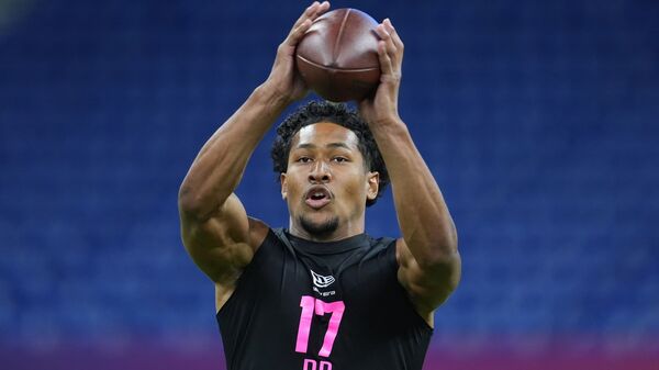FILE - San Diego State defensive back Chris Johnson (17) runs a drill at the NFL football scouting combine in Indianapolis, on Feb. 27, 2026. (AP Photo/Michael Conroy, File)