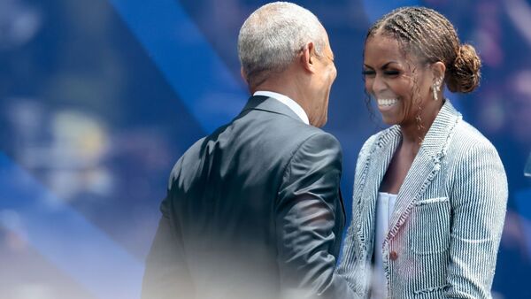 Former US President Barack Obama, left, and former US First Lady Michelle Obama during the opening of the Obama Presidential Center in the Jackson Park neighborhood of Chicago, Illinois, US, on Thursday, June 18, 2026. Photographer: Mustafa Hussain/Bloomberg