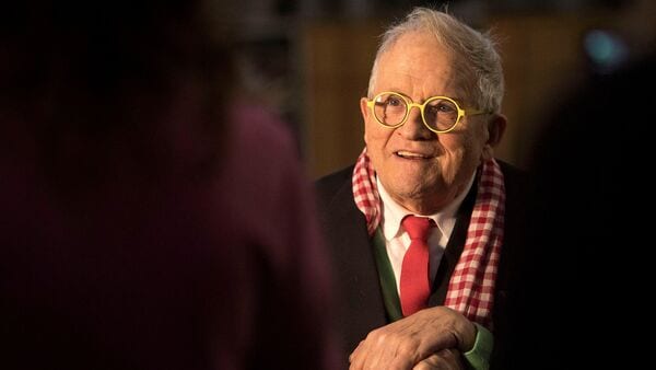 FILE PHOTO: British artist David Hockney poses inside Westminster Abbey, where he has designed a new stained glass window, in London, Britain, September 26, 2018. Victoria Jones/Pool via REUTERS/File Photo