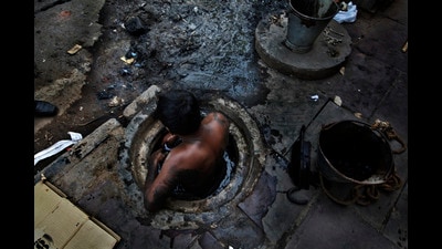 Possibly over a million people, most of them Dalits and many of them women, remain engaged in forms of manual scavenging and sanitation labour, removing human excrement with their bare hands, carrying it on their heads in baskets lined with sack material. (HT Archive)