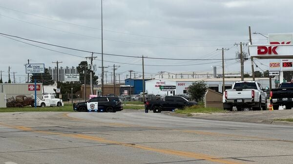 Law enforcement responds to an active shooting scene Friday, June 12, 2026, in Midland, Texas.