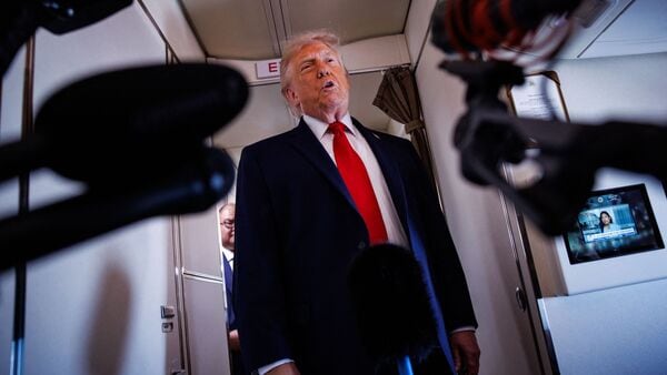 US President Donald Trump speaks with reporters while aboard Air Force One on June 5, 2026 en route to Chippewa Falls, Wisconsin.