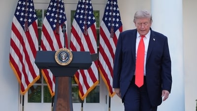 President Donald Trump walks to greet guests after speaking at a Rose Garden Club dinner with farmers, in the Rose Garden of the White House, Thursday, June 25, 2026, in Washington. (AP Photo)