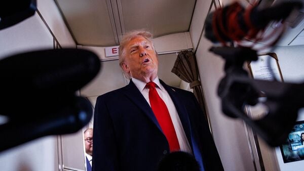 Donald Trump speaks with reporters while aboard Air Force One on June 5, 2026 en route to Chippewa Falls, Wisconsin.