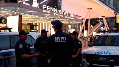 NYPD police officers are seen outside Penn Station in New York on June 7, 2026. Five people were wounded Sunday in a stabbing at New York's Penn Station, according to the city fire department, which said all victims were transported to hospital and the attacker was "in custody.". (Photo by John Lamparski / AFP) (AFP)