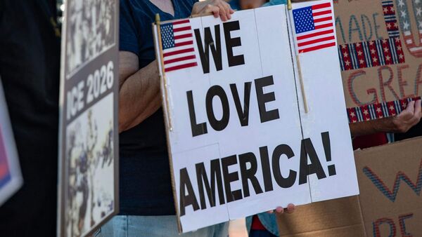 People participate in the All of US demonstration in Portsmouth, New Hampshire, on June 27, 2026.  (Photo by JOSEPH PREZIOSO / AFP)