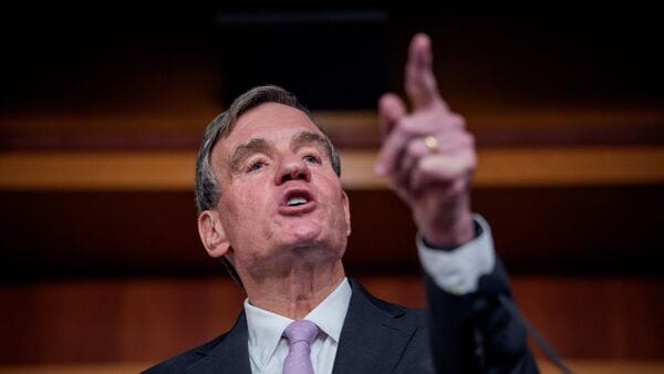 WASHINGTON, DC - JUNE 17: Senate Intelligence Committee Vice Chairman Sen. Mark Warner (D-VA) speaks during a news conference on Capitol Hill on June 17, 2026 in Washington, DC. U.S. President Donald Trump has withdrawn Jay Clayton's nomination to serve as Director of National Intelligence, reaffirmed his support for keeping Bill Pulte in the acting role, and pushed for the inclusion of the SAVE Act in any extension of the Foreign Intelligence Surveillance Act (FISA).   Andrew Harnik/Getty Images/AFP (Photo by Andrew Harnik / GETTY IMAGES NORTH AMERICA / Getty Images via AFP)