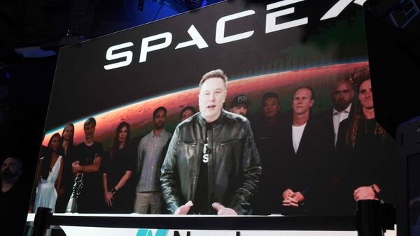 SpaceX founder and CEO Elon Musk speaks via video at the Nasdaq Marketsite in Times Square during the launch of the SpaceX initial public offering (IPO) on the Nasdaq on June 12, 2026, in New York City.