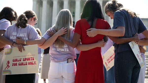 Defenders of female sports categories gather in front of the U.S. Supreme Court as they wait for rulings on June 30, 2026 in Washington, DC. Alex Wong/Getty Images/AFP