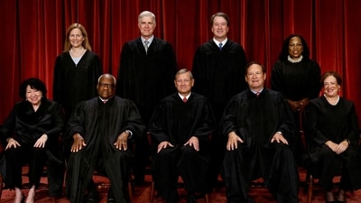 FILE PHOTO: U.S. Supreme Court justices pose for their group portrait at the Supreme Court in Washington, U.S., October 7, 2022. Seated (L-R): Justices Sonia Sotomayor, Clarence Thomas, Chief Justice John G. Roberts, Jr., Samuel A. Alito, Jr. and Elena Kagan. Standing (L-R): Justices Amy Coney Barrett, Neil M. Gorsuch, Brett M. Kavanaugh and Ketanji Brown Jackson. REUTERS/Evelyn Hockstein/File Photo (REUTERS)
