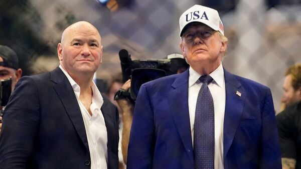 US President Donald Trump and Dana White, president of Ultimate Fighting Championship (UFC), in the Octagon during the UFC Freedom250 fight on the South Lawn of the White House in Washington, DC, US, early on Monday, June 15, 2026. UFC spent over $60 million to stage Sunday's fight, and more than seven federal agencies 'have allocated significant resources and manpower' to putting it on, according to filings in the court case, which sought unsuccessfully to stop the event.