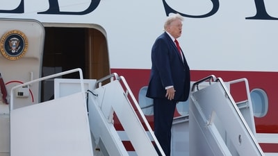 President Donald Trump boards the newly designated Air Force One, a formerly Qatari-owned jumbo jet that has been converted into the official U.S. presidential aircraft, at Joint Base Andrews, Md., Wednesday, July 1, 2026, to attend the opening of the Theodore Roosevelt Presidential Library in Medora, N.D. (AP Photo/Luis M. Alvarez)(AP Photo/Luis M. Alvarez (AP Photo/Luis M. Alvarez)