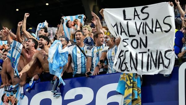 Argentina fans hold a banner with the words The Malvinas are Argentinian, referring to the Falkland Islands, at the end of the World Cup semifinal soccer match between England and Argentina in Atlanta, Wednesday, July 15, 2026.