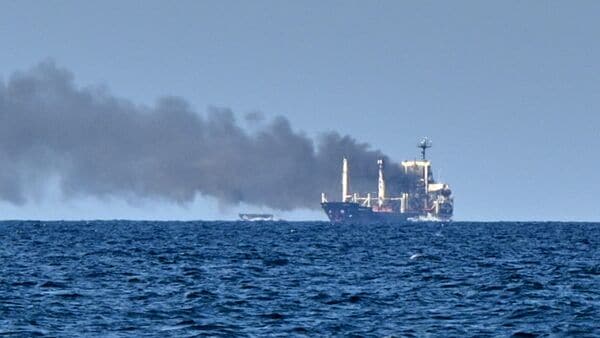 Smoke rises from the grain carrier Golden Leo under the Guinea-Bissau flag after Russian missile strike in the Black Sea close to Odessa, Ukraine