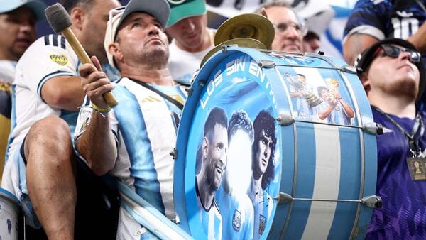 A fan plays a drum with the face of Lionel Messi of Argentina on during the FIFA World Cup 2026 Round of 16 match between Argentina and Egypt at Atlanta Stadium on July 07, 2026 in Atlanta, Georgia.