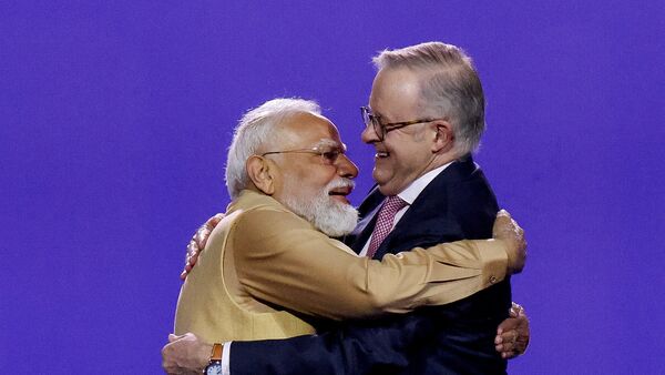Australian Prime Minister Anthony Albanese and Indian Prime Minister Narendra Modi embrace one another as they attend the Melbourne Meets Modi community event at Marvel Stadium in Melbourne, Australia, July 9, 2026  (REUTERS)