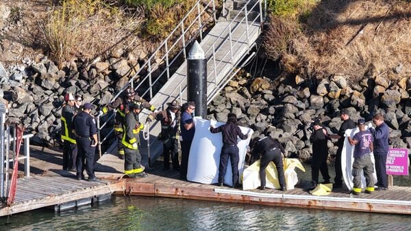 First responders prepare to move a body after a boat accident near Alcatraz Island off San Francisco, Tuesday, July 14, 2026.
