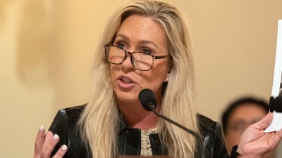 Marjorie Taylor Greene criticizes Defense Secretary Pete Hegseth's tribute to two service members killed in Iran, questioning the characterization of their deaths as a 'sacrifice' and accusing the Trump administration of waging a war for Israel. (AP)