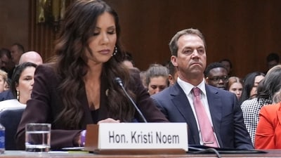 Homeland Security Secretary Kristi Noem, left, and her husband Bryon Noem, right, appears for an oversight hearing before the Senate Judiciary Committee, at the Capitol in Washington, Tuesday, March 3, 2026. Her husband, Bryon Noem, is seated at center. (AP Photo/J. Scott Applewhite) (AP)