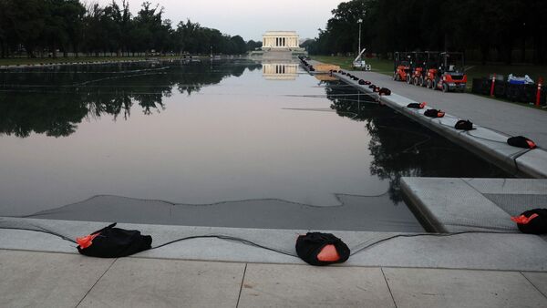 Netting is seen on the Lincoln Memorial Reflecting Pool in preparations for Independence Day fireworks on July 02, 2026 in Washington, DC. Kevin Dietsch/Getty Images/AFP