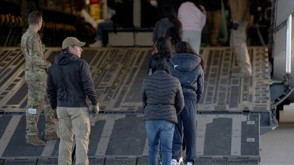 A US military flight carrying illegal immigrants deported from the country