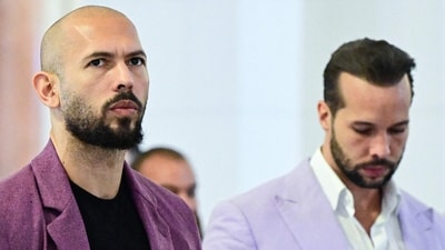Andrew Tate arrest update: ‘Poisoned water’ claim; Tristan Tate breaks silence. (Photo by Daniel MIHAILESCU / AFP) (AFP)