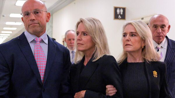 Lesley Groff (C), a former assistant to Jeffrey Epstein, arrives to testify at a closed-door interview with the House Oversight Committee on Capitol Hill on June 09, 2026 in Washington, DC. Chip Somodevilla/Getty Images/AFP
